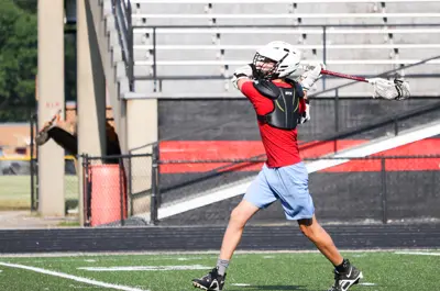 kid playing lacrosse
