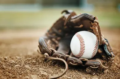 baseball in glove