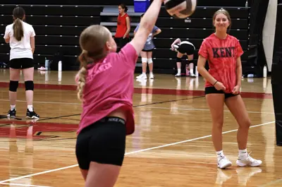 girls playing volleyball
