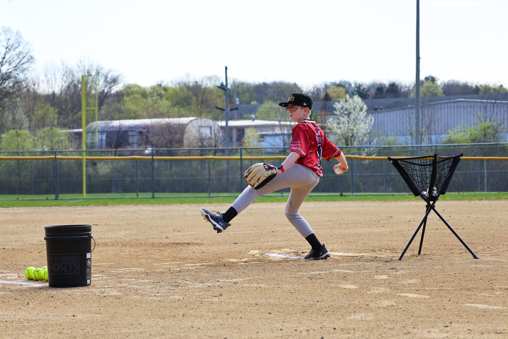kid throwing a baseball