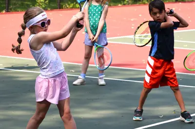 kids playing tennis